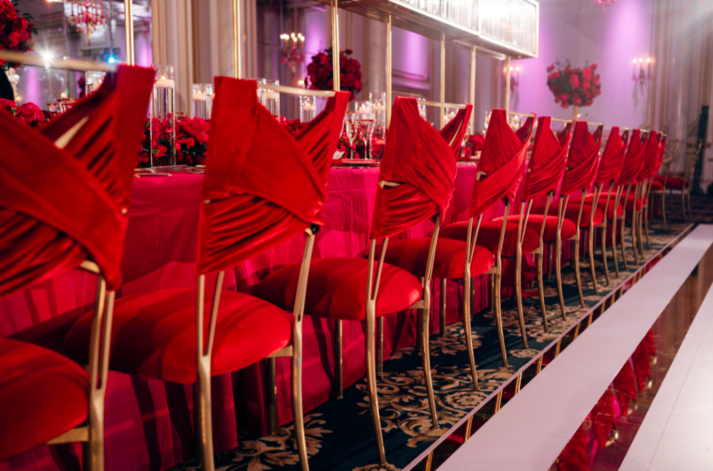 Romantic red wedding details, linen chair covers