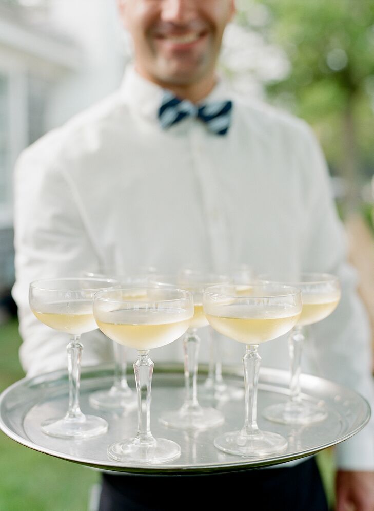 Champagne glasses at outdoor wedding
